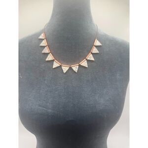 White and gold tone triangle necklace